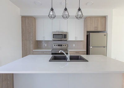 Front View Kitchen at The Ridge Townhomes for Rent in Cochrane